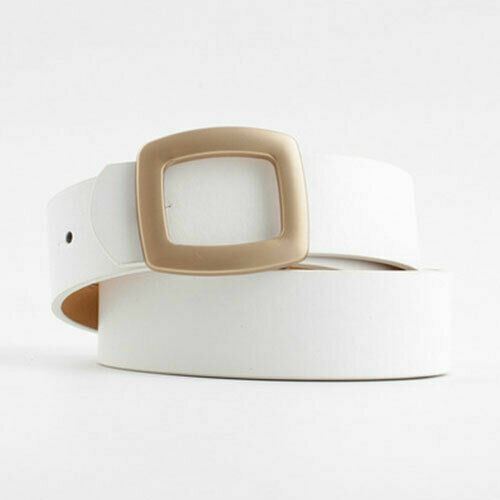 A white faux leather belt with a square, rounded metallic gold buckle, coiled on a seamless white background.