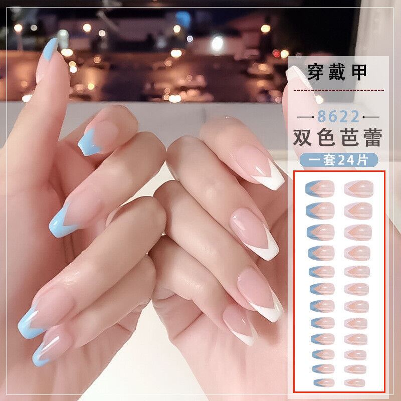 A pair of hands modeling false press-on nails with a French tip and light blue V-shaped accent design. A product information panel on the right shows the color code 8622, Chinese text, and a sheet of 24 nails.