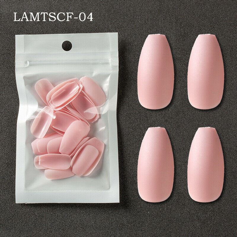 Four pink press-on nails displayed next to a clear plastic bag containing additional pink press-on nails, with the text 'LAMTSCF-04' in the top left corner, set against a dark gray textured background.