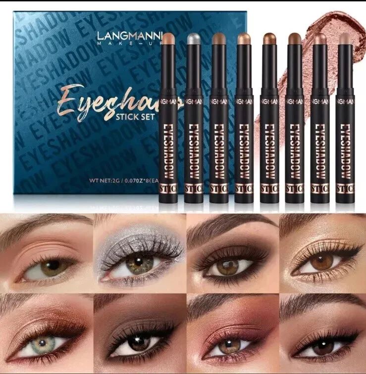 Langmanni Milano Eyeshadow Stick Set featuring eight black cosmetic pencils with gold and silver caps, shown alongside their blue packaging box and a swatch of shimmering eyeshadow. The bottom section displays eight close-up eye makeup looks demonstrating the shimmery bronze, silver, brown, and warm pink eyeshadow colors.