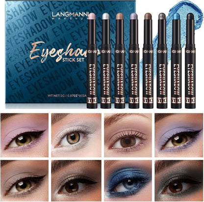 Langmanni Makeup Eyeshadow Stick Set featuring eight black cosmetic pencils with gold lettering, displayed alongside their blue patterned packaging and a grid of eight eye makeup swatches showing different eyeshadow colors.