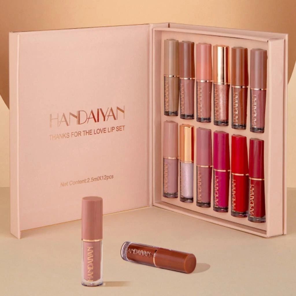 HANDAIYAN lip gloss set with open box on a beige background