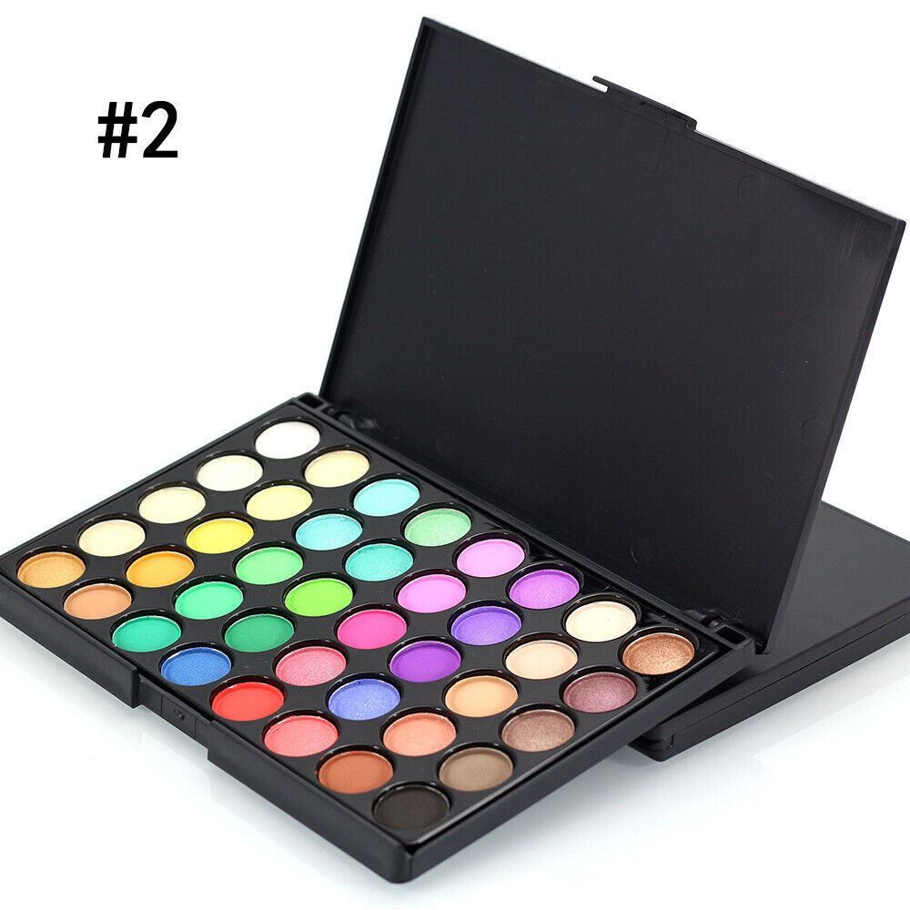 Makeup palette with various colors on a white background