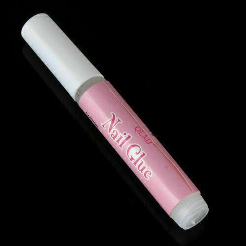 Pink nail glue in a cylindrical tube with a white cap, shown diagonally on a black reflective background. The brand name 'GLAM' is printed in pink script on the label.
