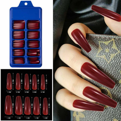 A collage showing a blue plastic tray of dark burgundy coffin-shaped press-on nails, a size chart with measurements for each nail shape, and a hand wearing the burgundy nails against a dark textured surface.