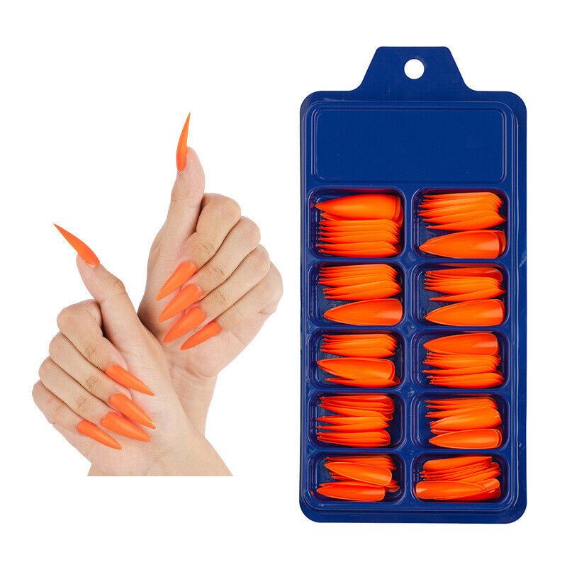 Orange false nails in a blue case with a hand model displaying the nails.