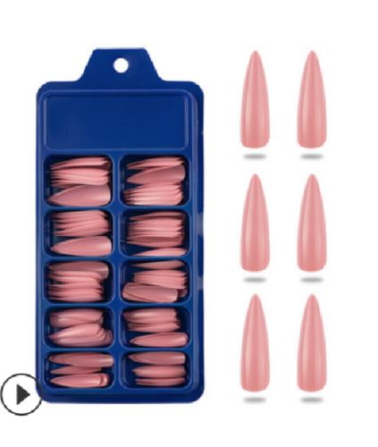 A blue plastic tray holding multiple pairs of pink false nails, shown next to six individual pointed almond-shaped pink nails on a white background.