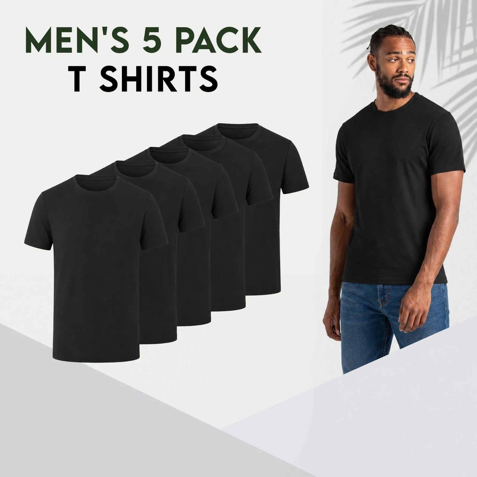 Five plain black short-sleeve crew-neck T-shirts arranged in a staggered row on a white 