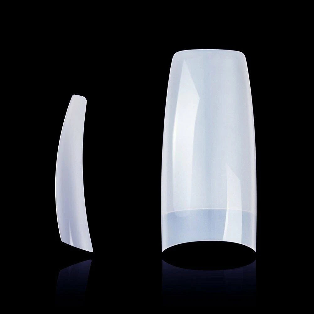 Two white cylindrical objects on a black background