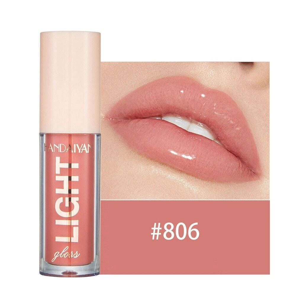 Lip gloss with a close-up of lips wearing the color, brand 'Huda Beauty' visible.