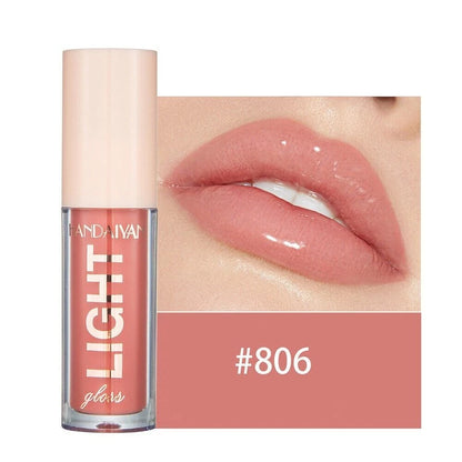 Lip gloss with a close-up of lips wearing the color, brand 'Huda Beauty' visible.