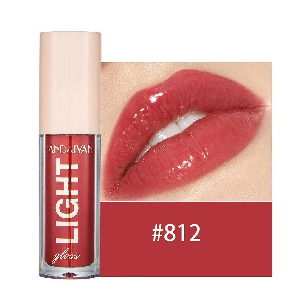 Lip gloss with a close-up of lips wearing the product, showing color #812.
