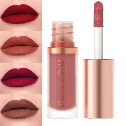 A liquid lipstick shown with its cap off, alongside four close-up lip swatches demonstrating different shades: deep red, muted terracotta, deep burgundy, and warm brown. The tube is frosted with rose gold metallic accents and gold lettering that reads 'Emma D U'.