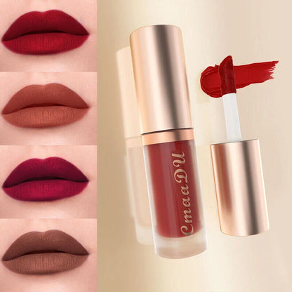 A liquid lipstick tube with its cap off, shown next to four lip swatches demonstrating different shades: deep red, muted terracotta, rich burgundy, and dark brown. The tube has a rose gold metallic cap and body with the brand name 'Cmaadu' printed in gold script.