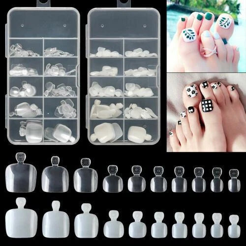 A set of clear plastic compartment organizer boxes containing assorted press-on toe nail tips, shown alongside rows of individual toe nail shapes in different sizes on a black background, with inset photos of feet displaying decorated toenails.